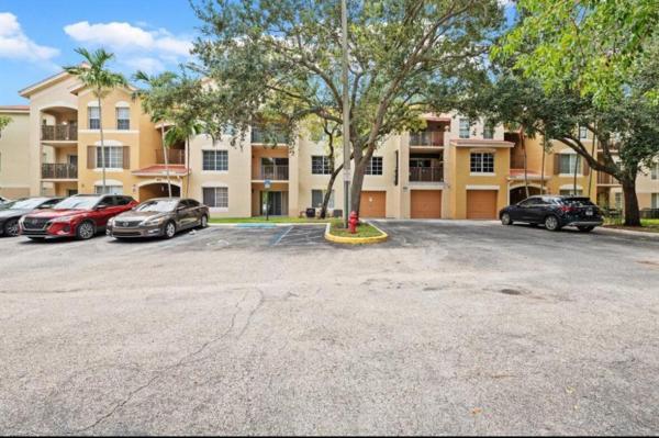 Emerald Isle At Laguna Lakes, 4151 San Marino Blvd #107, West Palm Beach, Florida 33409, image 1