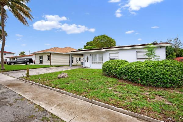 Esquire Lake Estates, 2341 NW 12th Ct, Pompano Beach, Florida 33069, image 1
