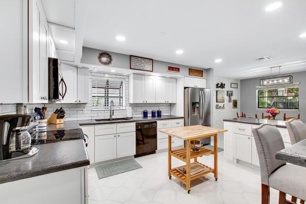 Sugar Pond Manor, 912 Blueberry Dr, Wellington, Florida 33414, image 1