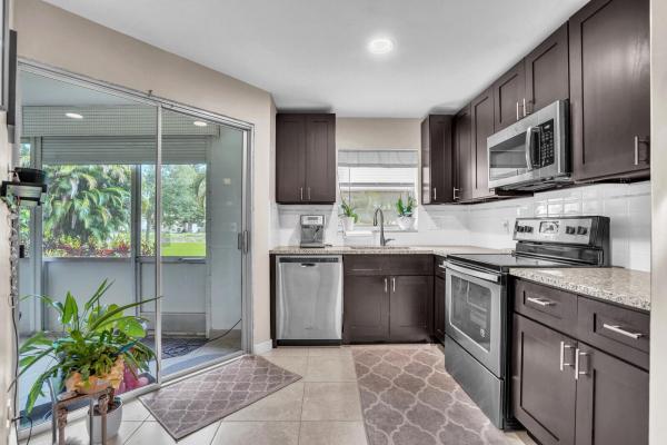 Norfolk At Poinciana Place, 3524 Via Poinciana #102, Lake Worth Beach, Florida 33467, image 1