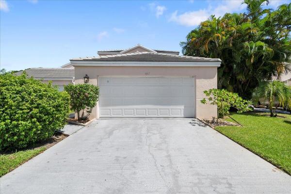 The Island Of River Bridge, 1007 Island Manor Dr, Greenacres, Florida 33413, image 1