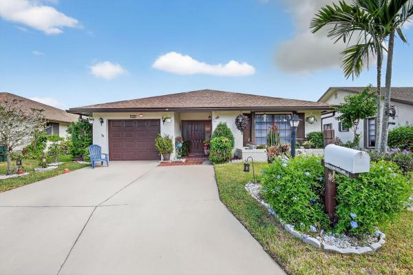 Buttonwood, 6119 Peachtree Ln, Greenacres, Florida 33463, image 1