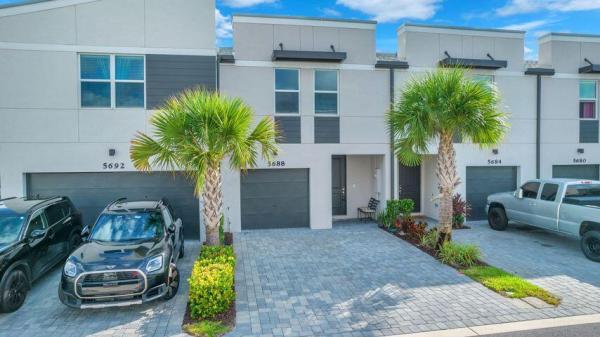 Enclave At Mangonia Park, 5688 Mentmore Dr, Mangonia Park, Florida 33407, image 1