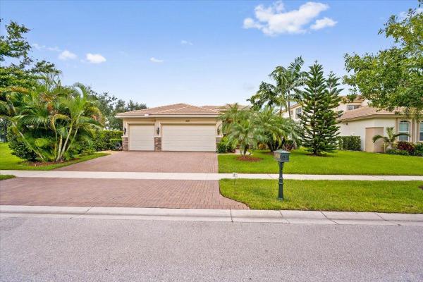 Greenwood Manor, 8152 Butler Greenwood Dr, Royal Palm Beach, Florida 33411, image 1