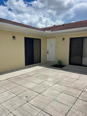 Westchester Townhouses, 4379 Woodstock Dr #A, West Palm Beach, Florida 33409, image 1