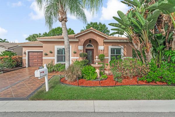 Caribe Isle At River Bridge, 136 Caribe Ct, Greenacres, Florida 33413, image 1