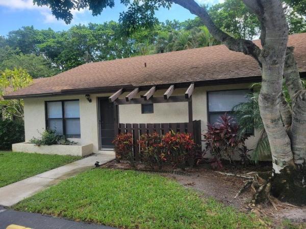 Tradewinds At Dos Lagos, 66 Via De Casas Norte, Boynton Beach, Florida 33426, image 1