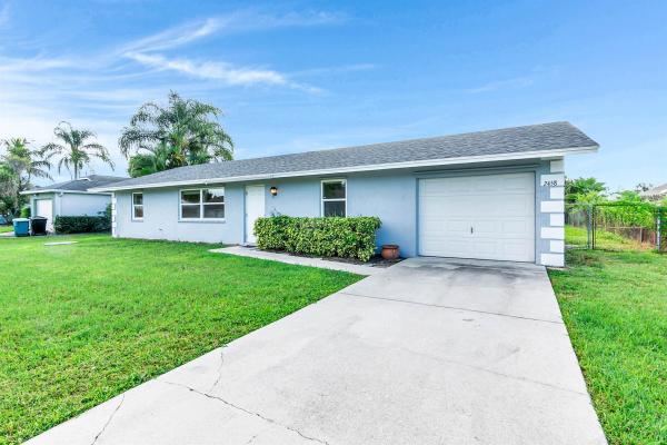2458 SW Hinchman St, Port St. Lucie, Florida 34984, image 1