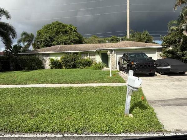 Lone Pine Estates, 203 Canterbury Dr W, Riviera Beach, Florida 33407, image 1
