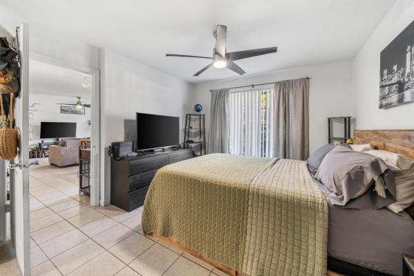 Emerald Isle At Laguna Lakes, 4115 San Marino Blvd #107, West Palm Beach, Florida 33409, image 1