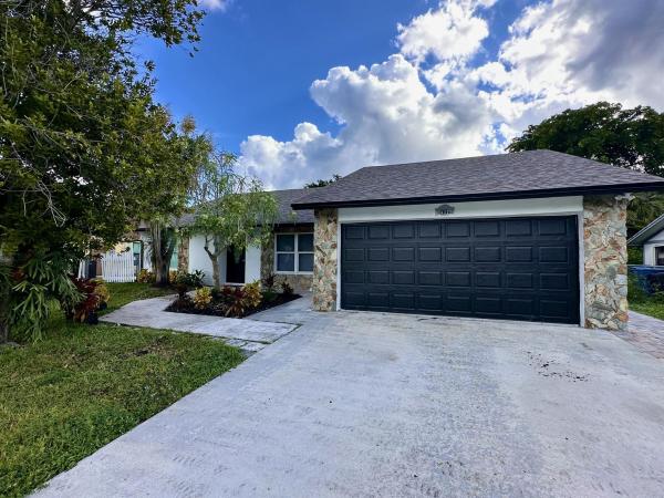 La Mancha, 127 Cordoba Cir, Royal Palm Beach, Florida 33411, image 1