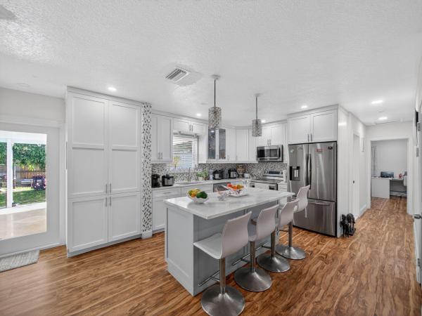 Lake Clarke Isle, 7026 Pine Tree Ln, Lake Clarke Shores, Florida 33406, image 1