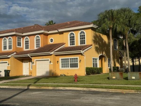 Pine Grove Townhomes, 5822 Erik Way, Greenacres, Florida 33463, image 1