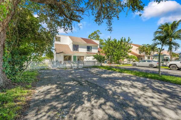 Place In The Woods At Pine Cone Estates, 9056 Green Meadows Way, Palm Beach Gardens, Florida 33418, image 1