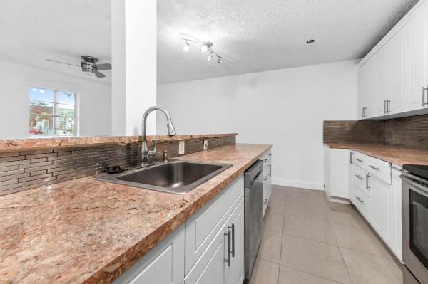 Sabal Palm Village, 5190 E Sabal Palm Blvd #104, Tamarac, Florida 33319, image 1