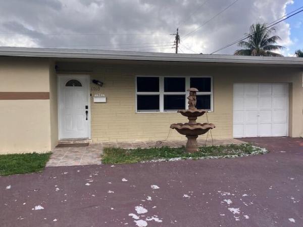 Sunrise Golf Village, 6760 NW 25th Ct, Sunrise, Florida 33313, image 1