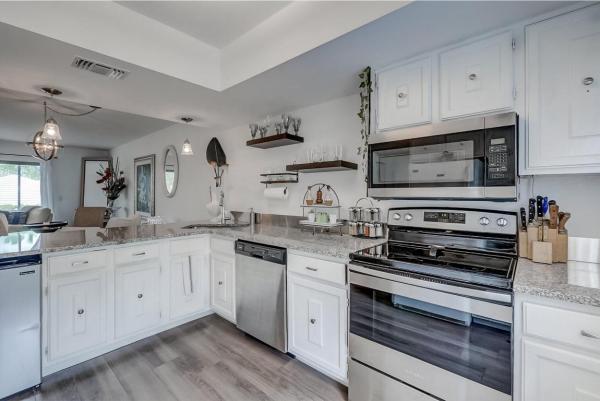 Riverbend Country Club, 18350 SE Wood Haven Ln #J, Jupiter, Florida 33469, image 1