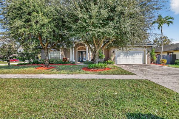 Sugar Pond Manor, 1500 Firethorn Dr, Wellington, Florida 33414, image 1