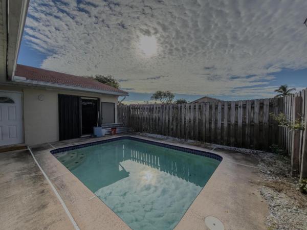 Westchester Townhouses, 4377 Woodstock Dr #C, West Palm Beach, Florida 33409, image 1