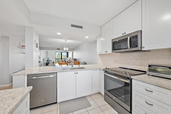 The Ocean South At The Bluffs, 301 S Seas Dr #305, Jupiter, Florida 33477, image 1
