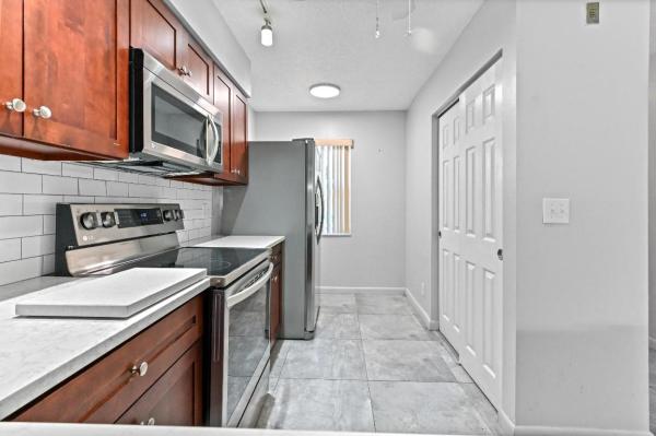 International Club At Villages Of Oriole, 14895 Builtmore Way #107, Delray Beach, Florida 33446, image 1