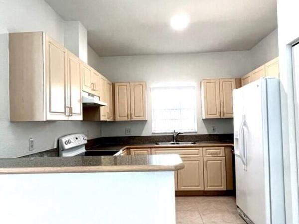 Sugar Pond Manor, 1434 Hawthorne Pl, Wellington, Florida 33414, image 1